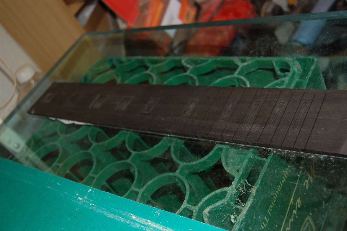 fretboard with inlay recesses cut