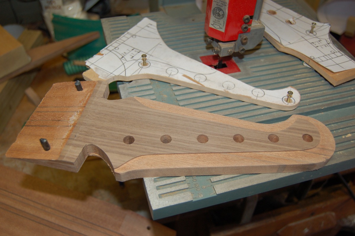 shaped headstock with alignment dowels