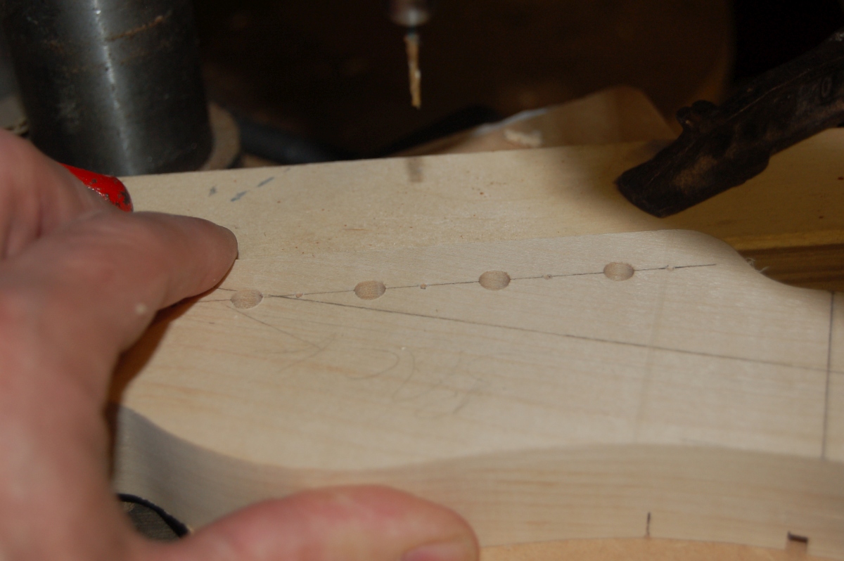 drilling tuner screw holes